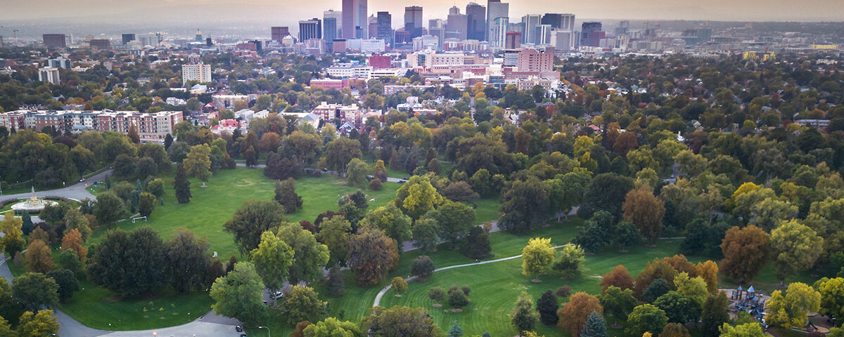 Community management company in Denver skyline at sunset