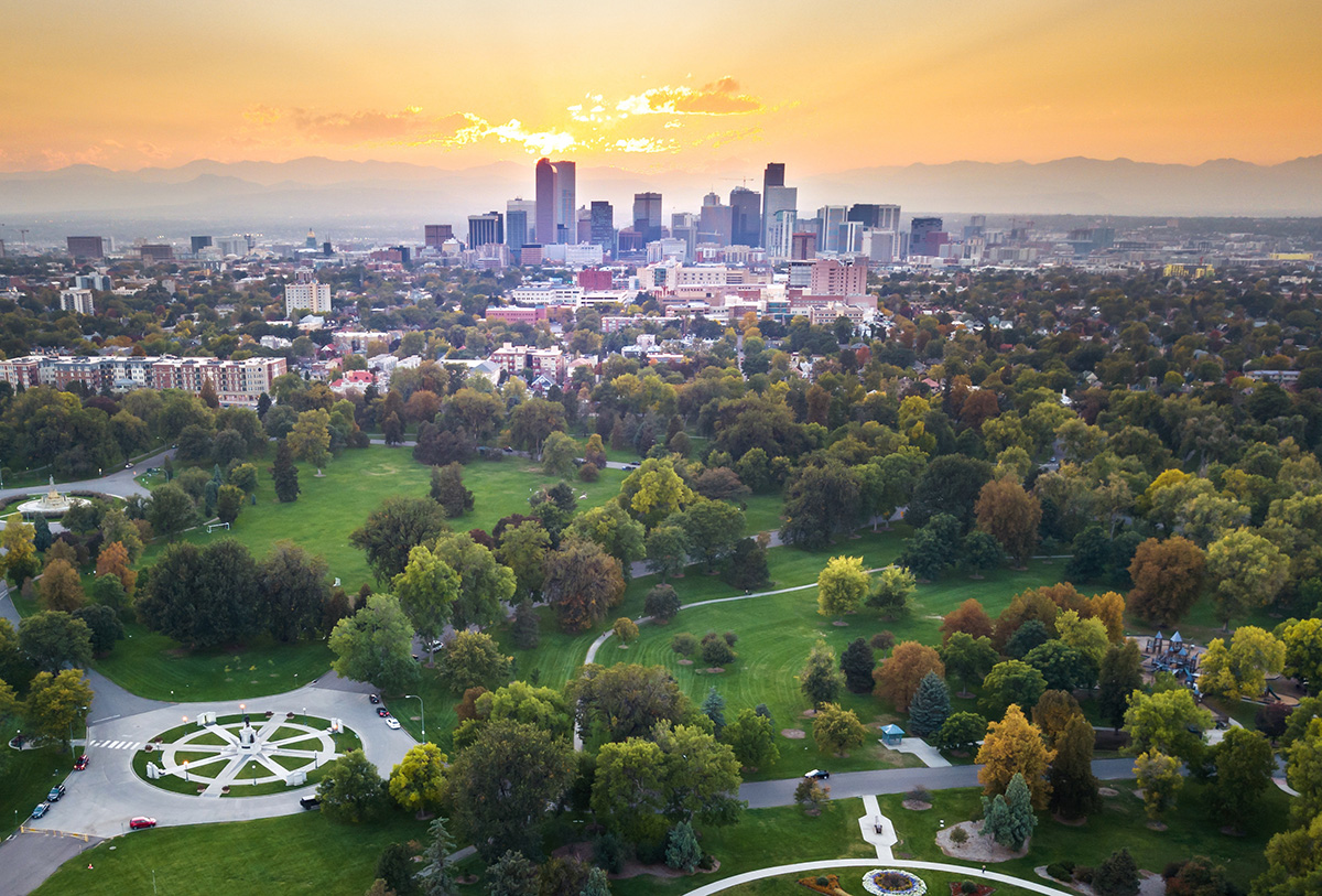 Community management company in Denver skyline at sunset