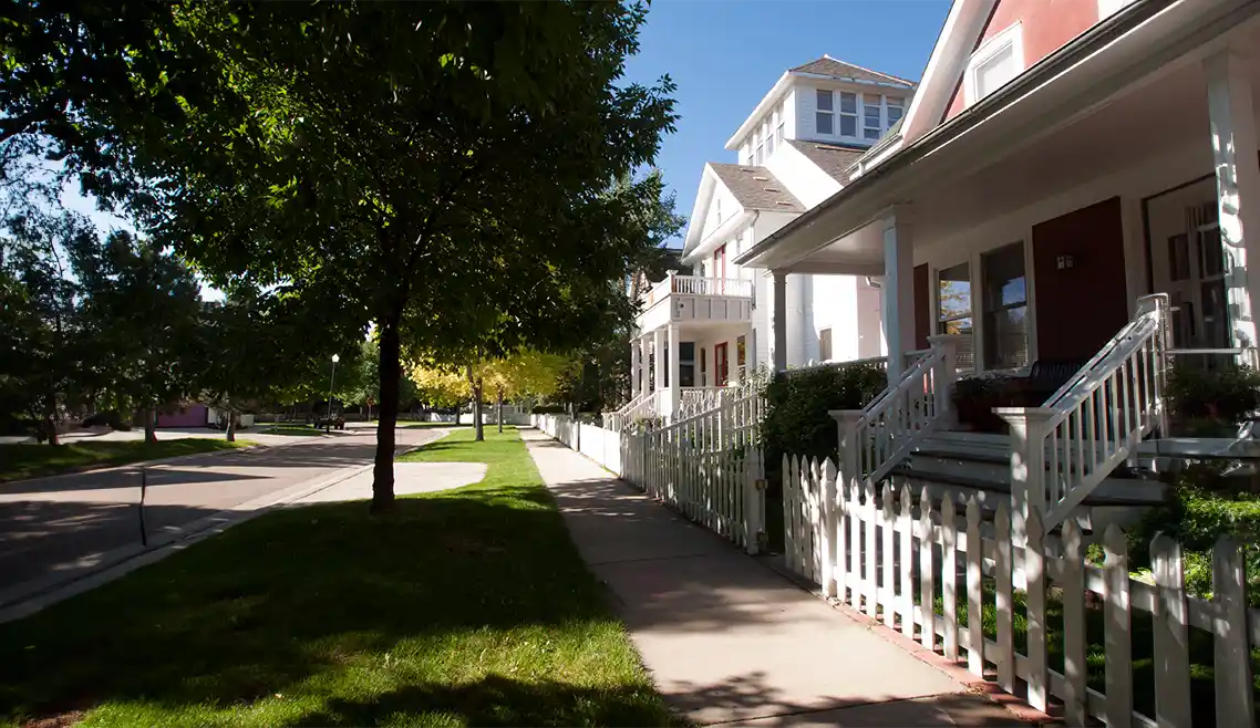 Longmont CO Community Management Company - shady streetside home